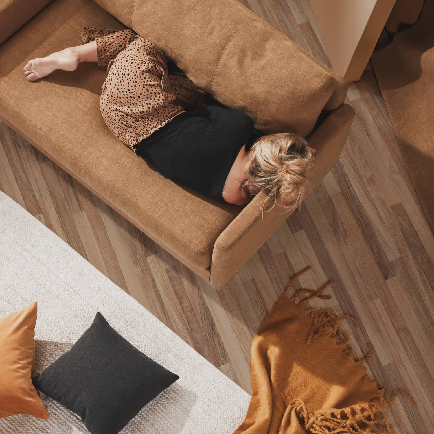 Hired three-seat lounge and coffee table set up in a living room